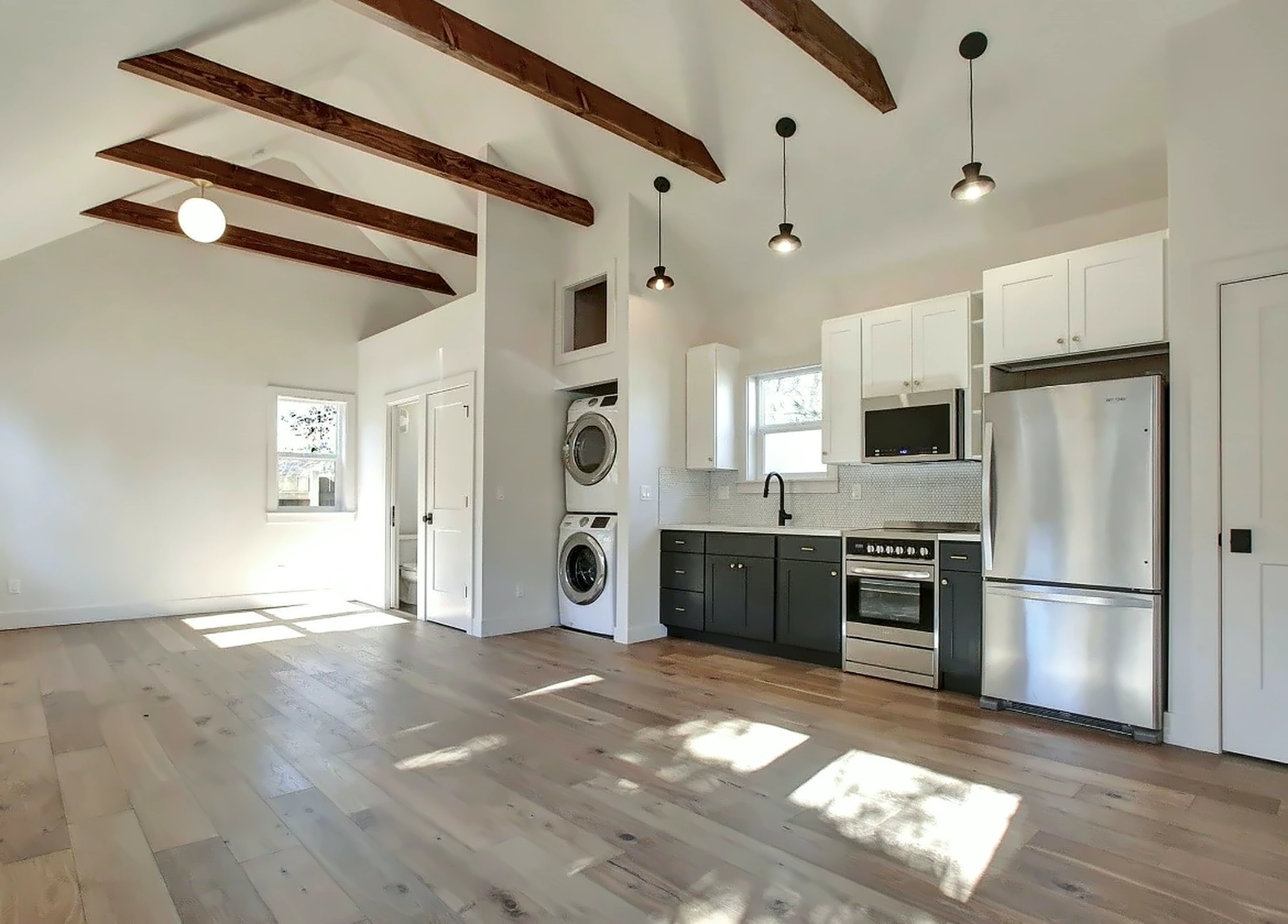 A finished ADU with vaulted ceilings built by Pasqual-Rup Construction